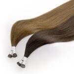 Two bundles of GENIUS WEFT Hair Extensions 7-Star Full Cuticle Remy Hair in brown and hazelnut colors